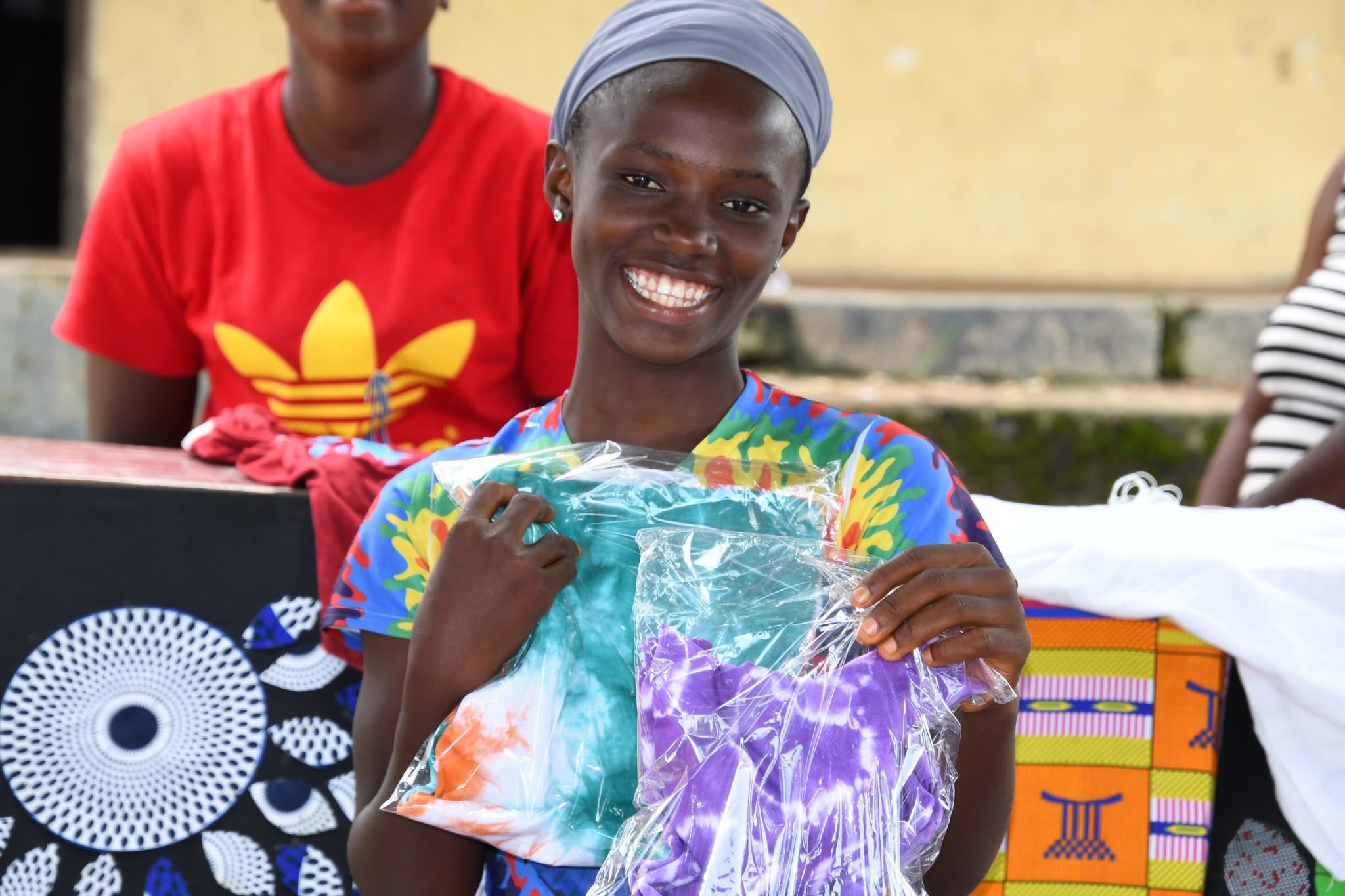 Participant showing handmade work