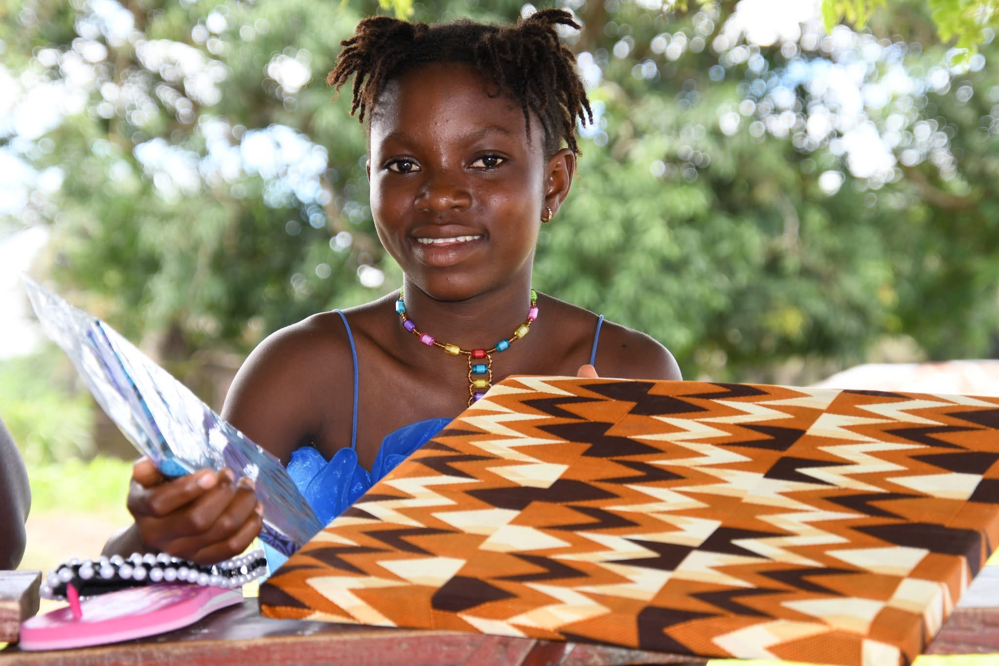 Participant presenting Gara fabric